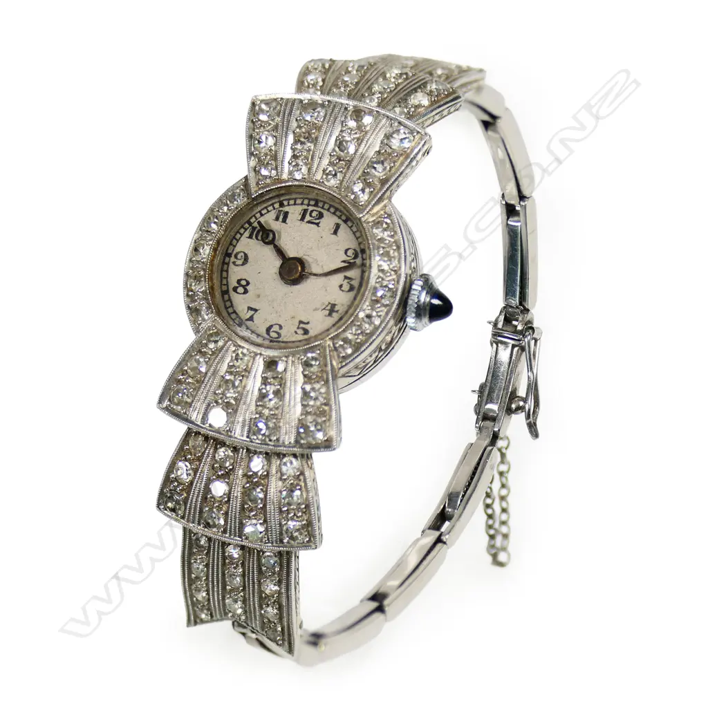 An Art Deco platinum and diamond ladies cocktail watch, Image 1++