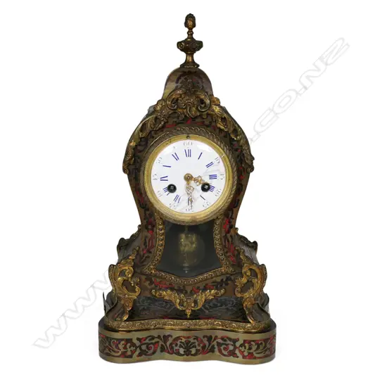 A 19thC French boulle mantel clock on stand,