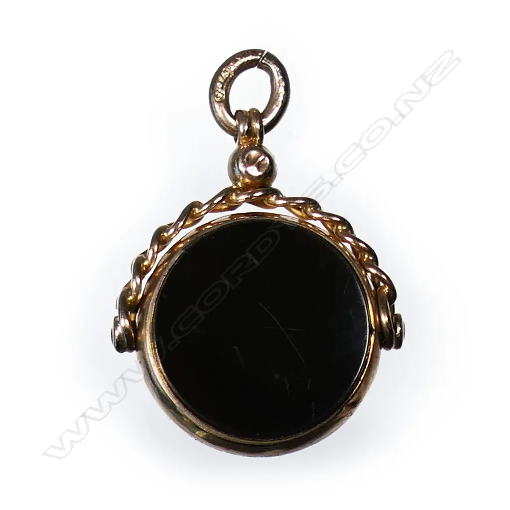 An Edwardian 9ct rose gold and hardstone fob swivel, Image 1++