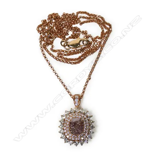 An 18ct rose gold and pink diamond ring/pendant converting necklace,