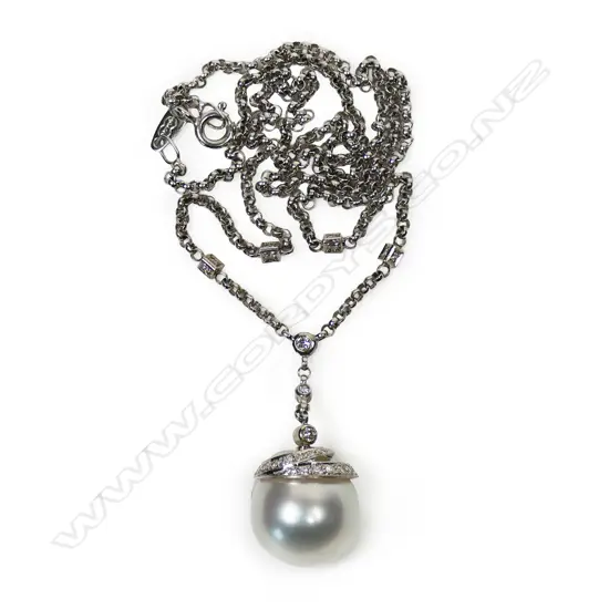 An 18ct white gold pearl and diamond pendant,