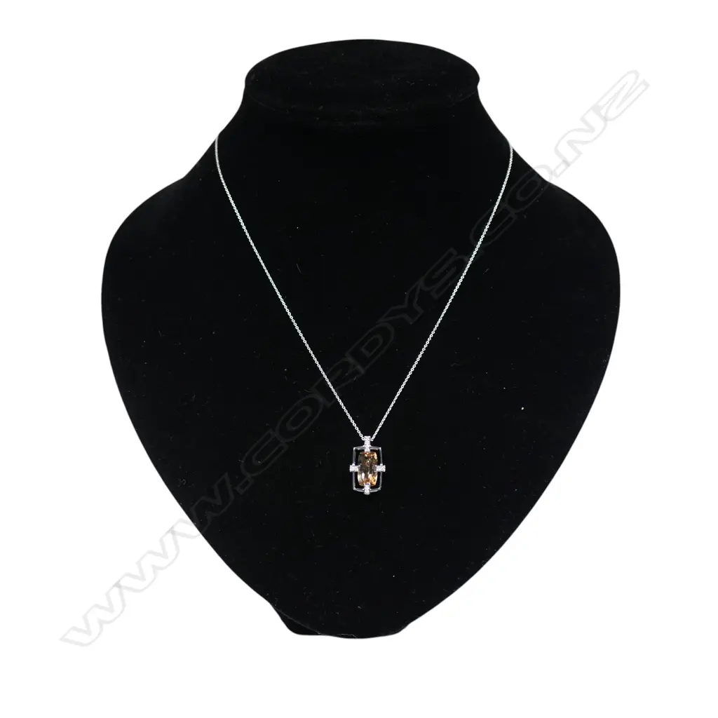 A 14ct white gold peach tourmaline and diamond pendant necklace, Image 1++