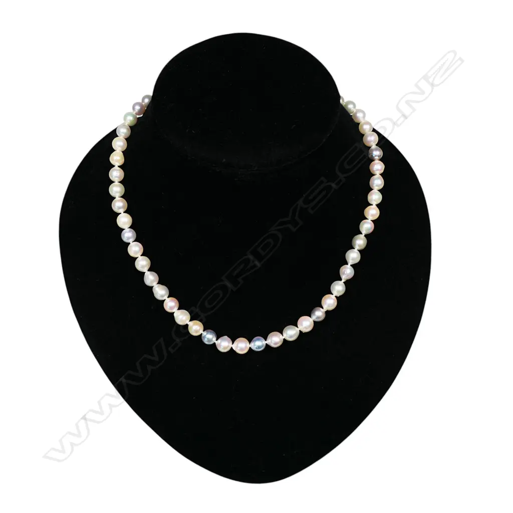 A uniform white cultured semi-baroque pearl necklace, Image 1++