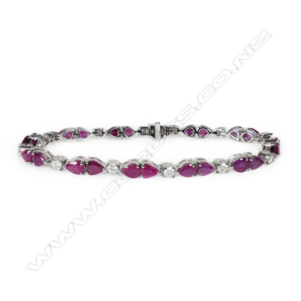 A 14ct white gold diamond and ruby bracelet, Image 1++