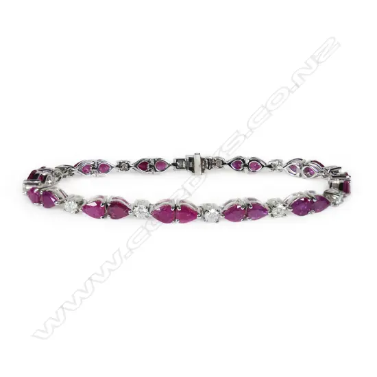 A 14ct white gold diamond and ruby bracelet,