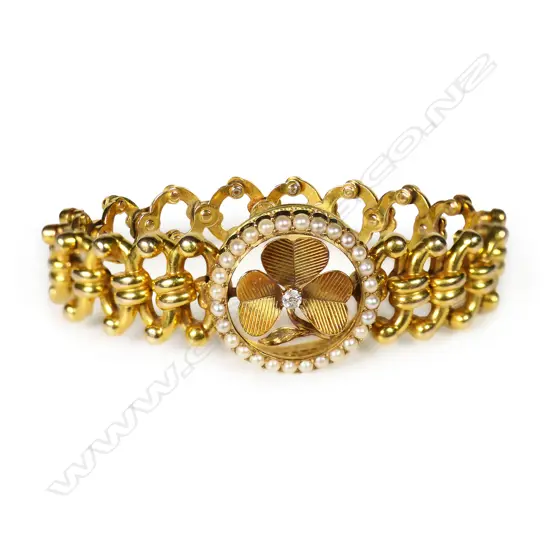 An estate15ct gold pearl and diamond bracelet,