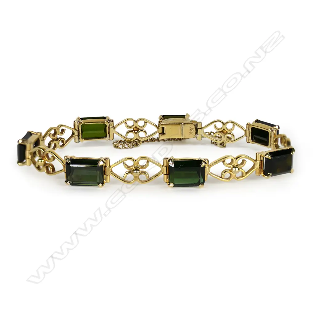 A traditional 18ct yellow gold and seven green tourmaline bracelet, Image 1++