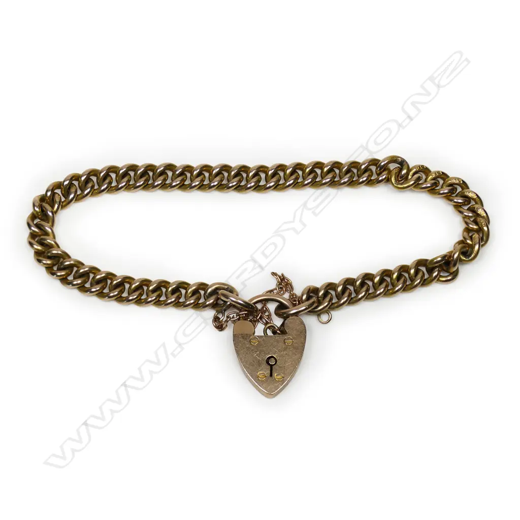 An Edwardian 9ct gold solid curb link bracelet, Image 1++