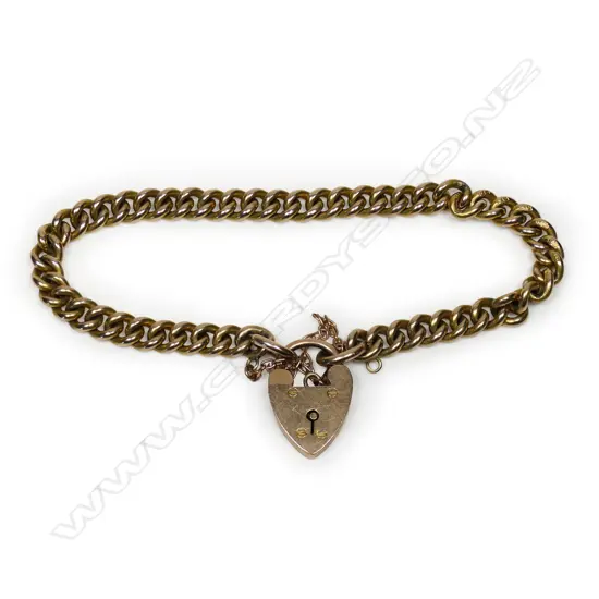 An Edwardian 9ct gold solid curb link bracelet,
