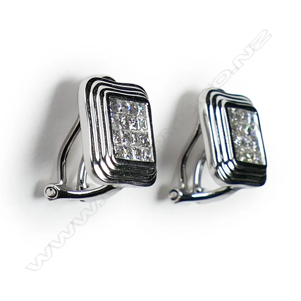 A pair of 18ct white gold and diamond earrings, Image 1++