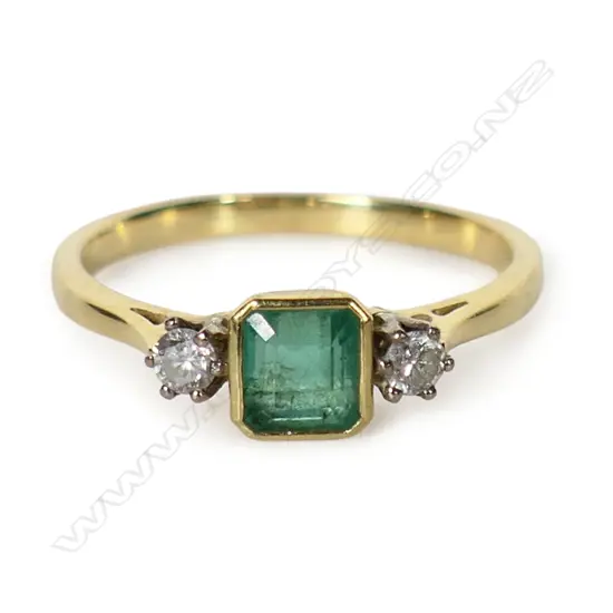 A vintage 18ct yellow and white gold emerald and diamond ring,