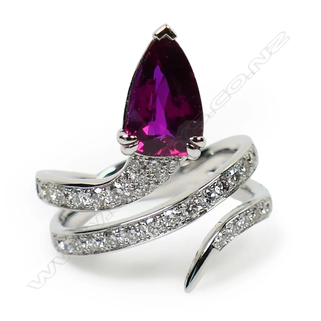 An 18ct white gold ruby and multi diamond snake ring, Image 1++