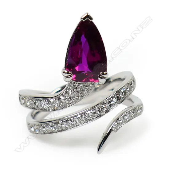 An 18ct white gold ruby and multi diamond snake ring,