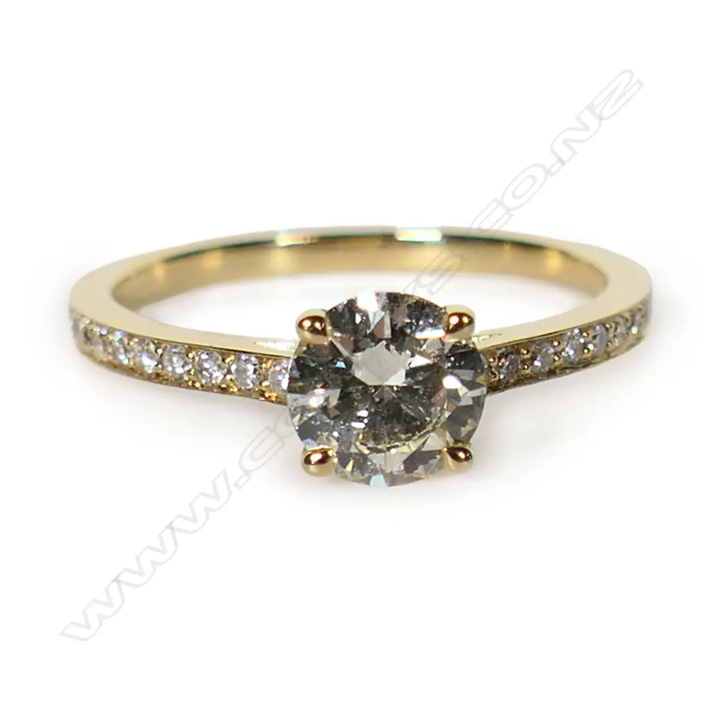 An 18ct yellow gold and diamond 0.96ct solitaire ring, Image 1++