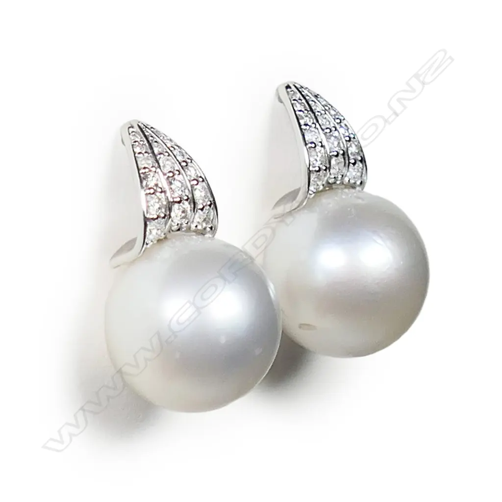 A pair of 14ct white gold diamond and South Sea pearl earrings, Image 1++