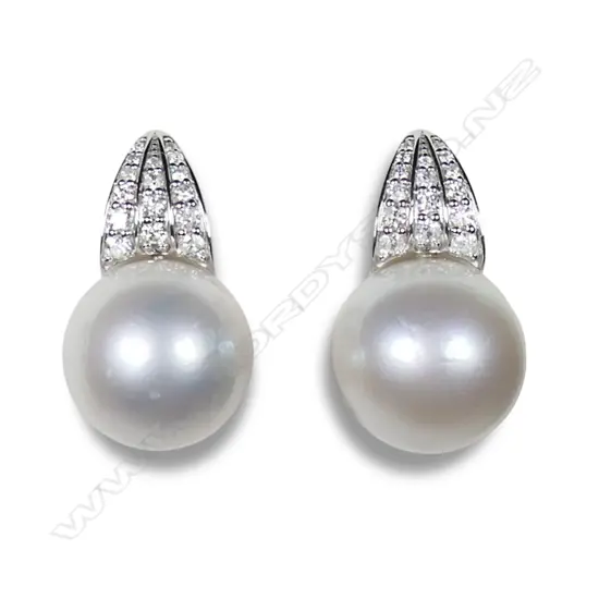A pair of 14ct white gold diamond and South Sea pearl earrings,