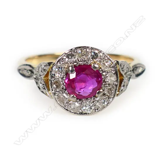 An estate 18ct gold diamond and ruby ring,