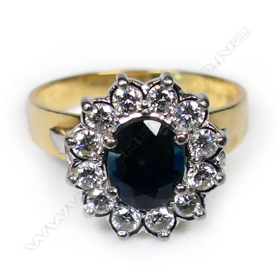 An 18ct gold sapphire and diamond ring,