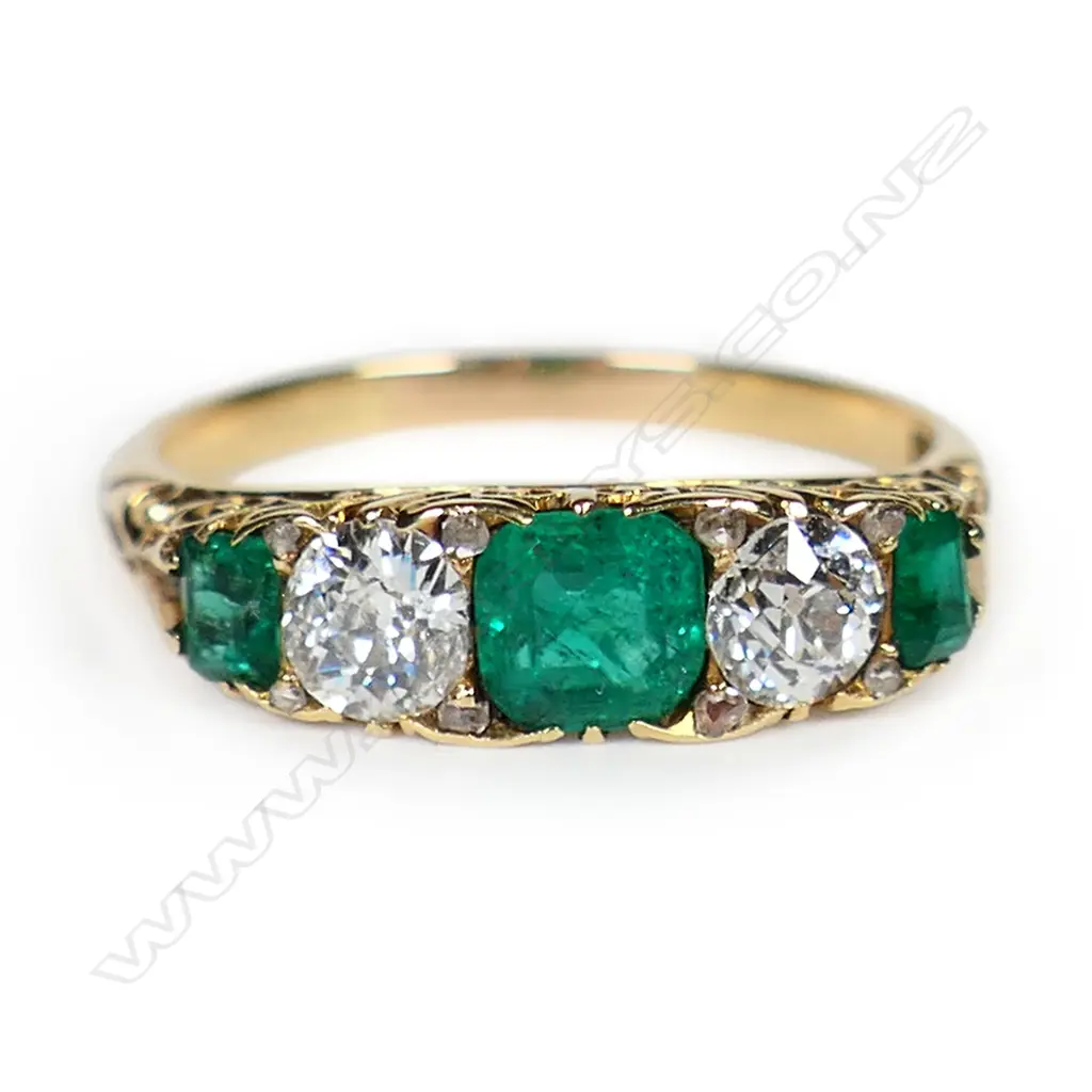 An estate 18ct gold emerald and diamond ring, Image 1++