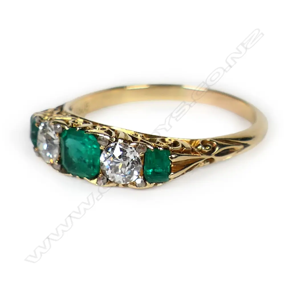 An estate 18ct gold emerald and diamond ring, Image 1++