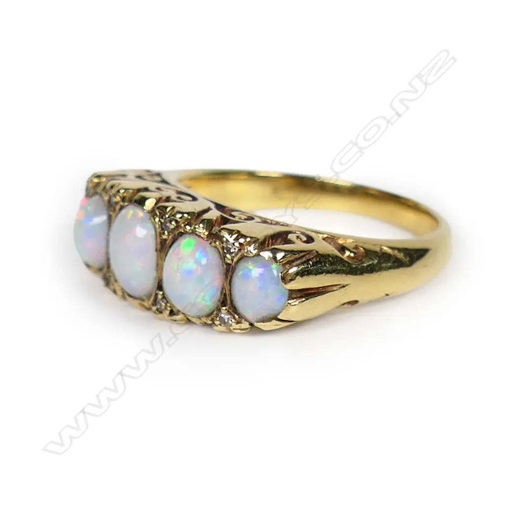 An estate 18ct gold opal and diamond ring, Image 1++