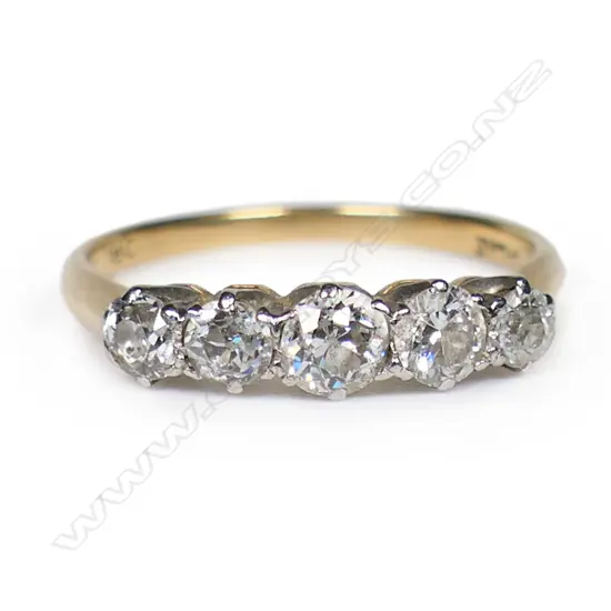An estate 18ct gold and five stone diamond ring,