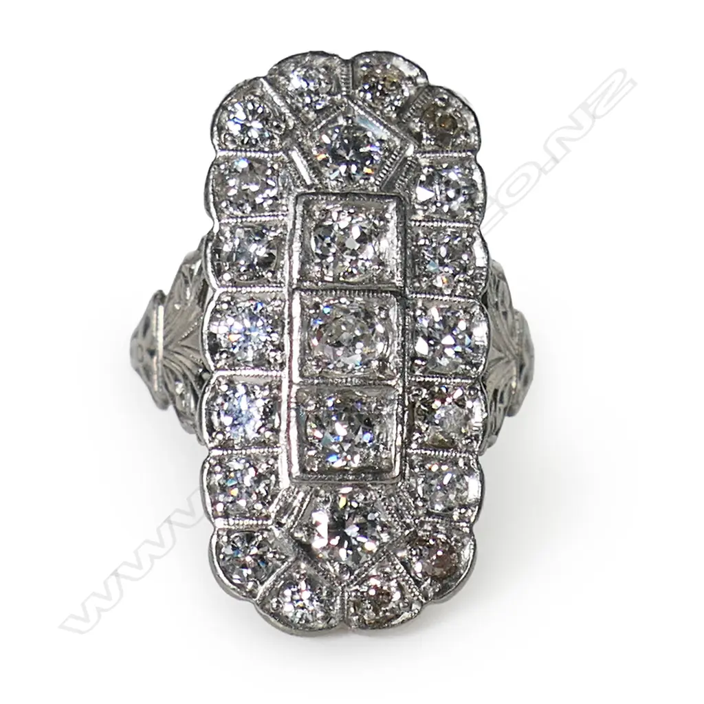 An estate palladium and diamond dress ring, Image 1++