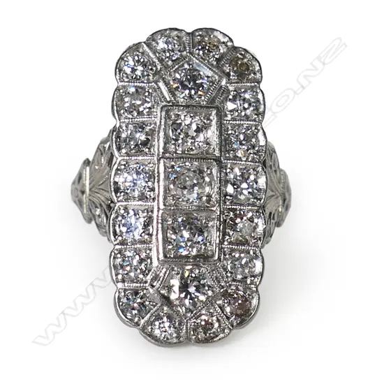 An estate palladium and diamond dress ring,