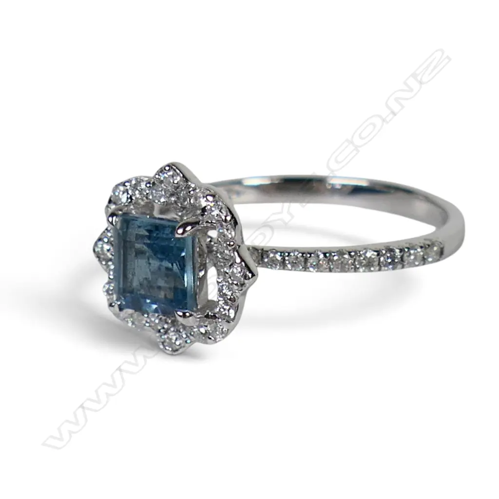 A 14ct white gold Santa Maria aquamarine and diamond halo ring, Image 1++