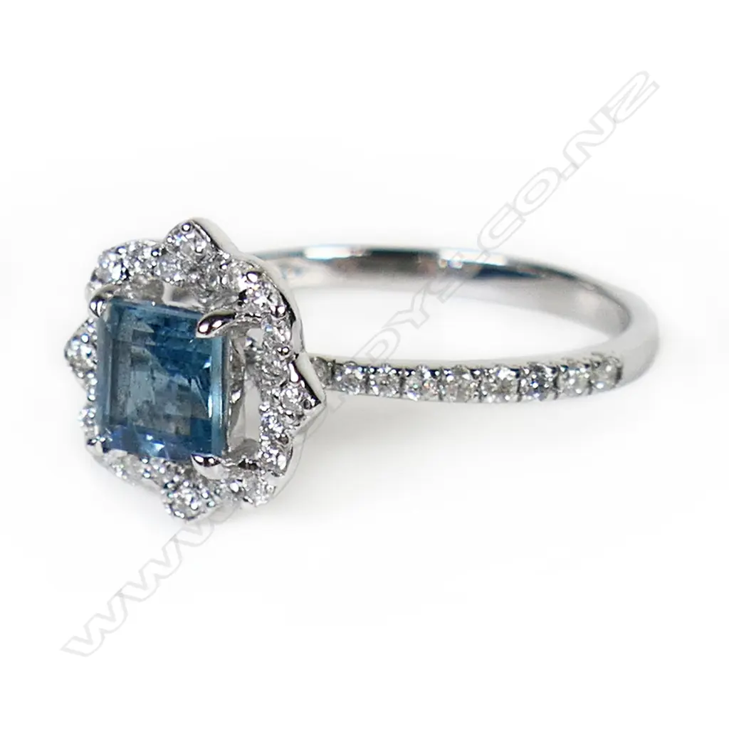 A 14ct white gold Santa Maria aquamarine and diamond halo ring, Image 1++