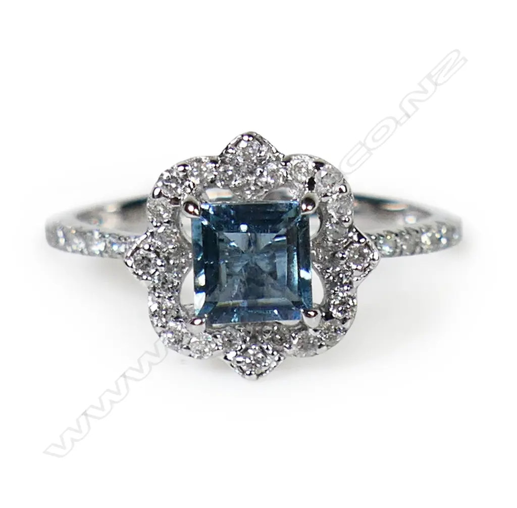 A 14ct white gold Santa Maria aquamarine and diamond halo ring, Image 1++