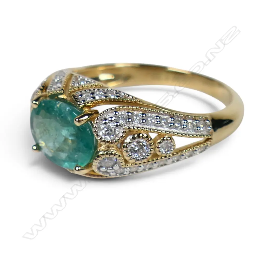 A 14ct gold emerald and diamond dress ring, Image 1++