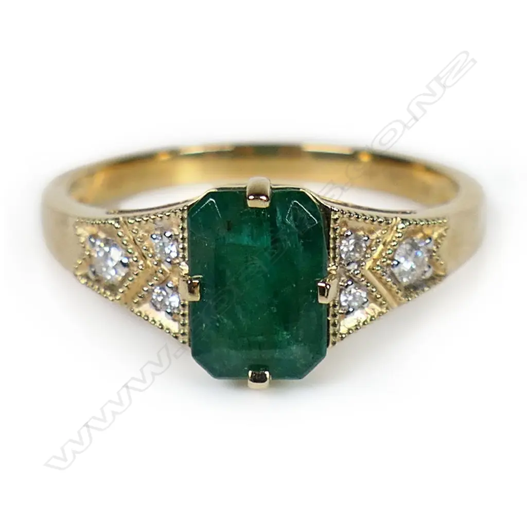 A 14ct gold emerald and diamond ring, Image 1++