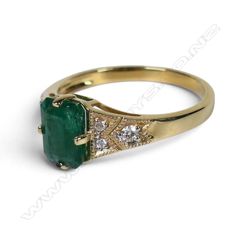 A 14ct gold emerald and diamond ring, Image 1++