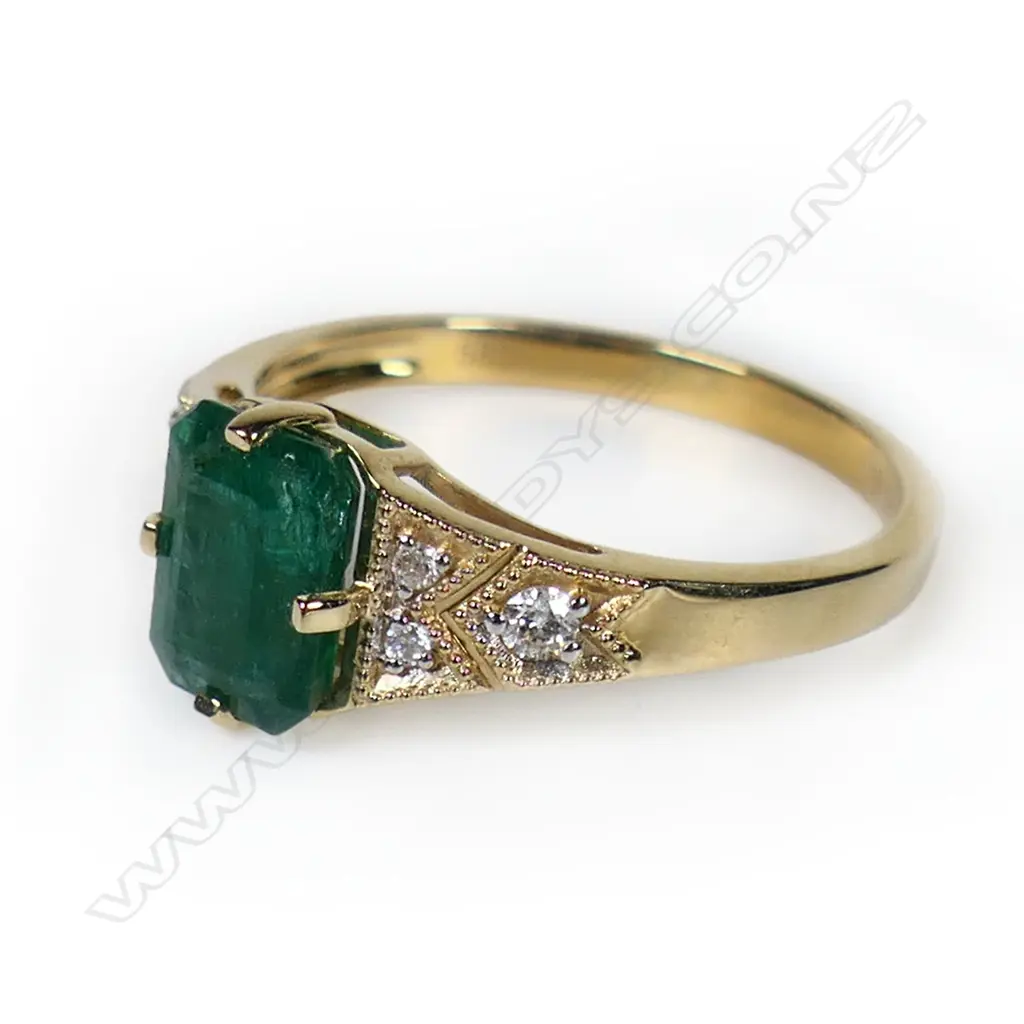 A 14ct gold emerald and diamond ring, Image 1++