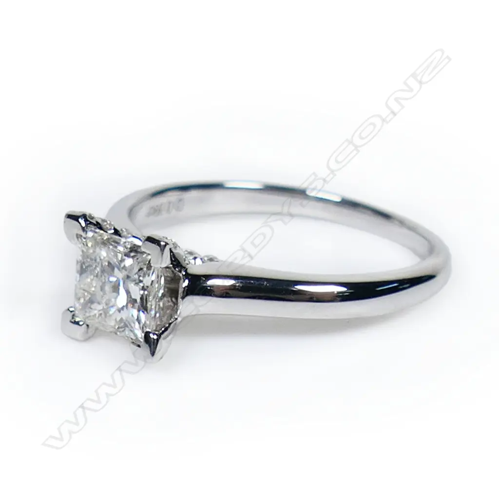 A 14ct white gold and diamond solitaire ring, Image 1++