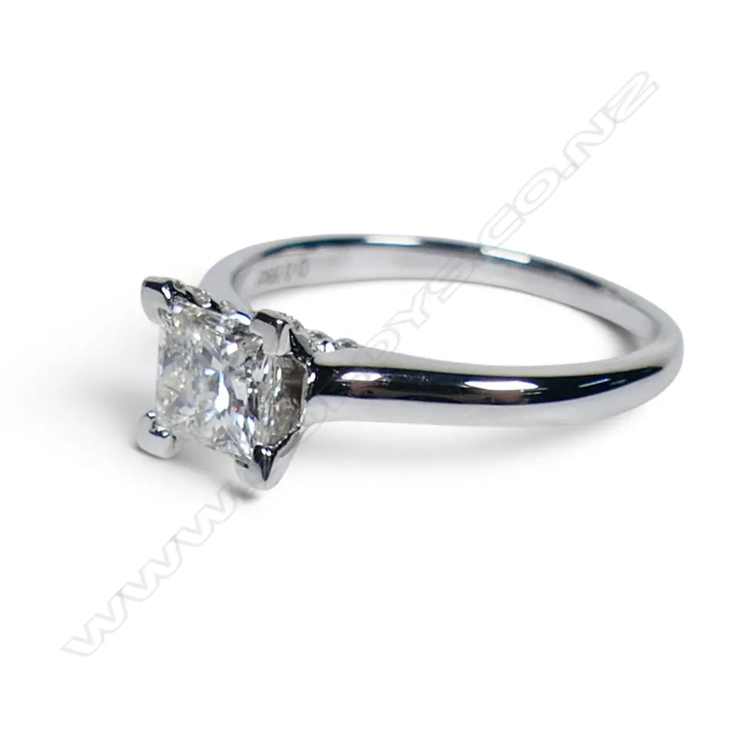 A 14ct white gold and diamond solitaire ring, Image 1++