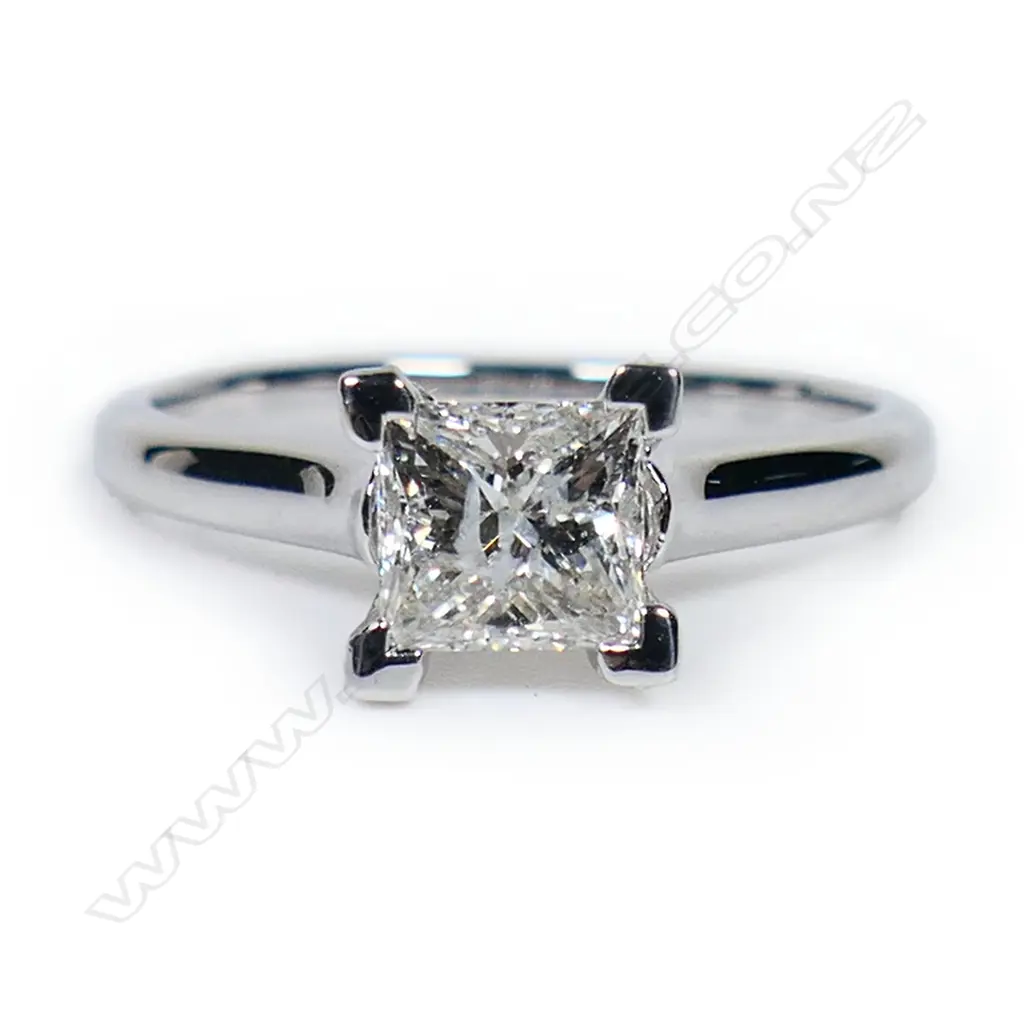 A 14ct white gold and diamond solitaire ring, Image 1++