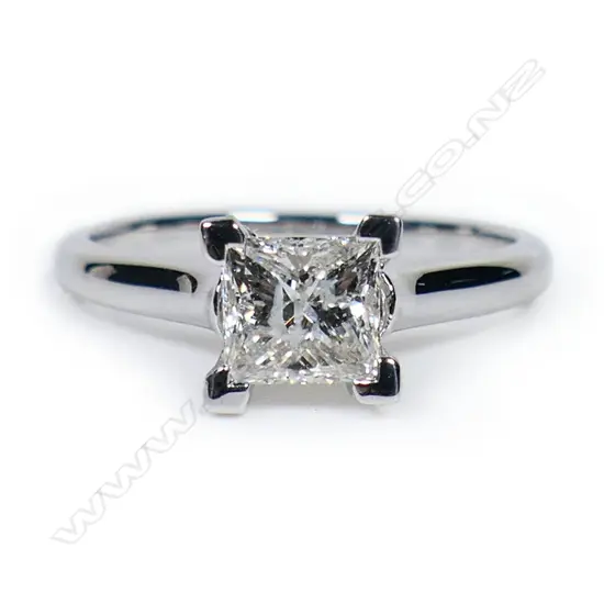 A 14ct white gold and diamond solitaire ring,