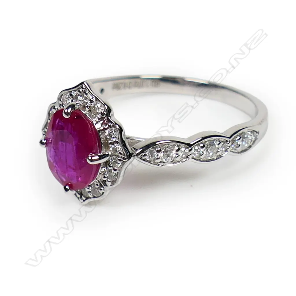 A 14ct white gold ruby and diamond ring, Image 1++