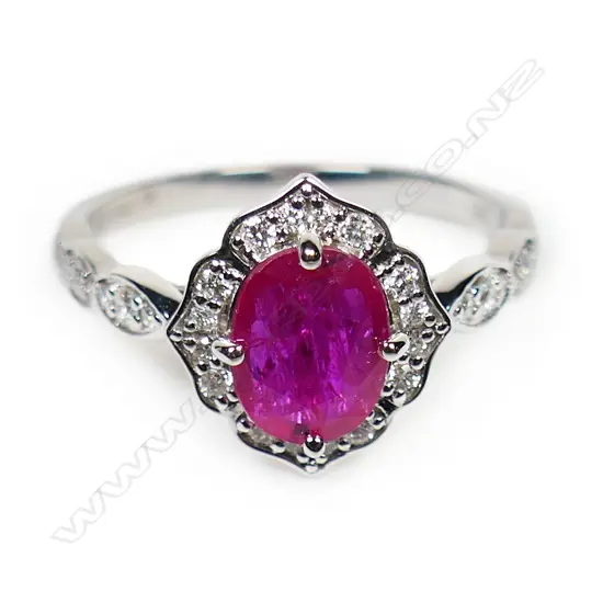 A 14ct white gold ruby and diamond ring,