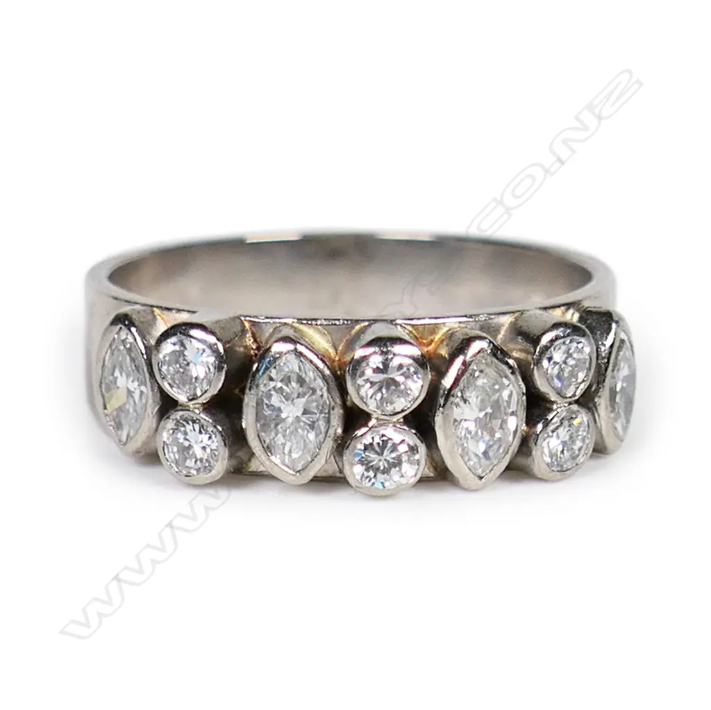 A 9ct white gold and diamond set band, Image 1++
