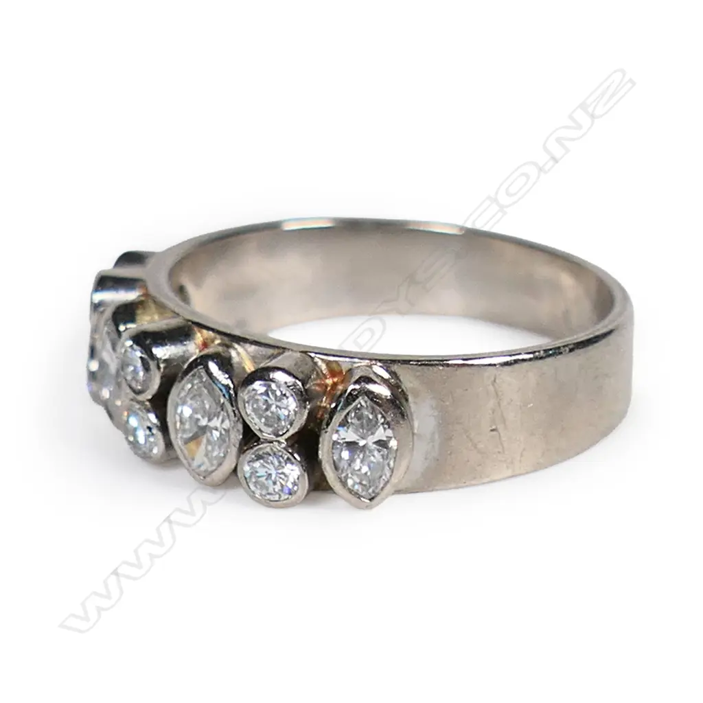 A 9ct white gold and diamond set band, Image 1++