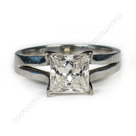 A 14ct white gold and large diamond solitaire ring,