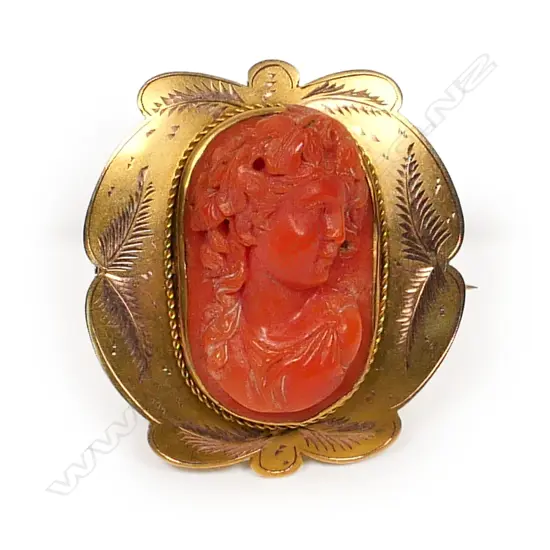 A Victorian 9ct gold and red coral cameo brooch,