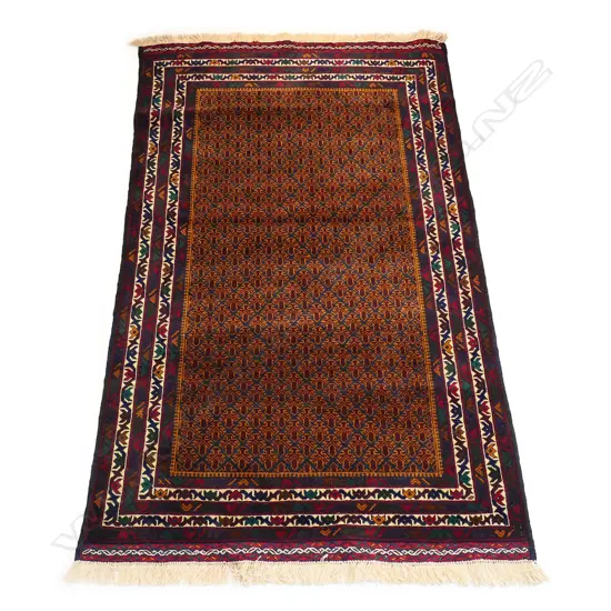 A hand knotted Baluch rug,
