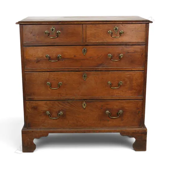A Georgian oak five drawer flat front chest,