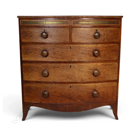 A Georgian mahogany bow front chest of drawers,