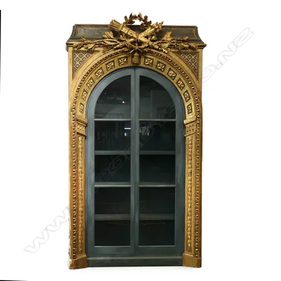 A large and impressive 19thC French painted and carved gilt wood architectural arch,