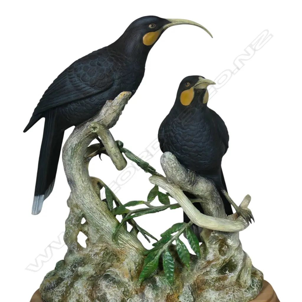 A pair of contemporary sculpted resin huia birds on naturalistic branch trunk base, Image 1++